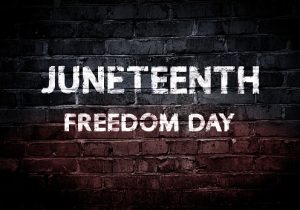 Graphic - Juneteenth Freedom Day greeting banner. African - American Independence day. White text on old brick wall texture, mixed media.