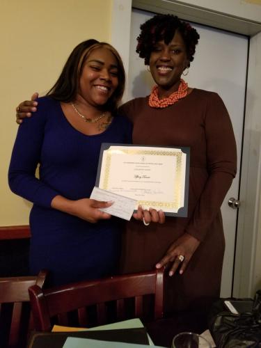 Nursing Student scholarship award recipient and the Scholarship Committee chair.
